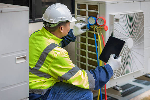 Professional Emergency Ac Repair technician working in Connersville, IN